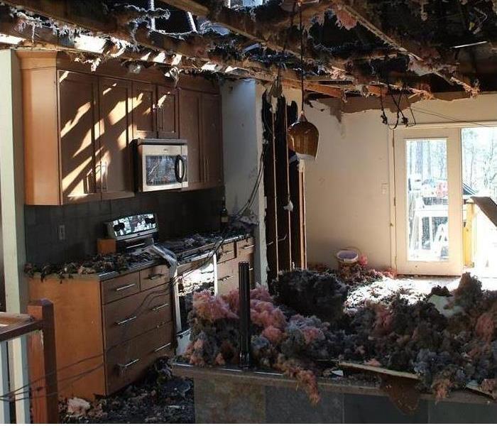 severly fire damaged kitchen 